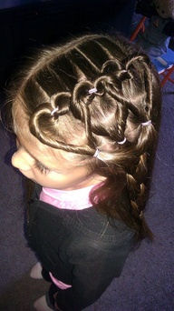 Small girl with heart patterns in her hair