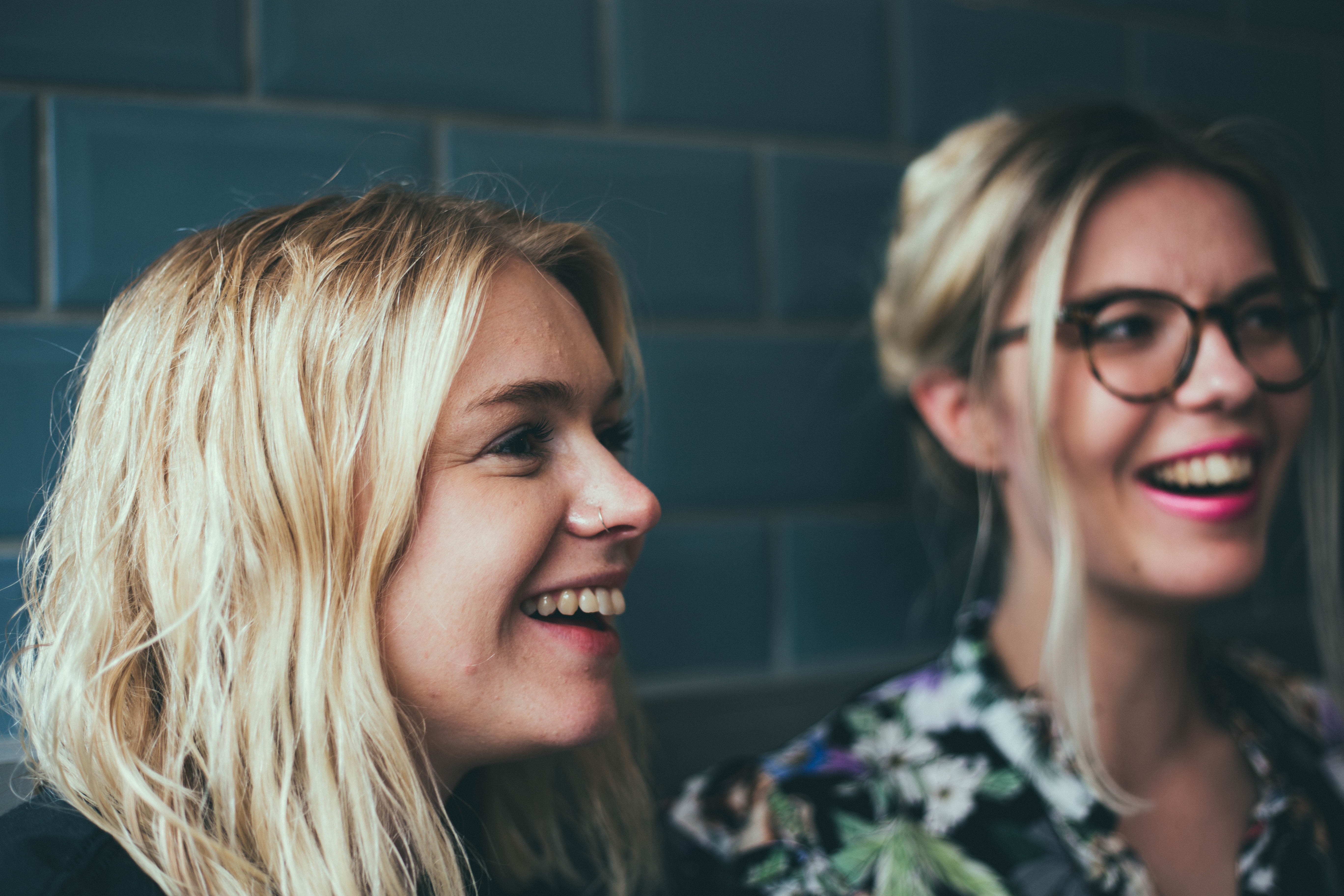 two women laughing and having fun